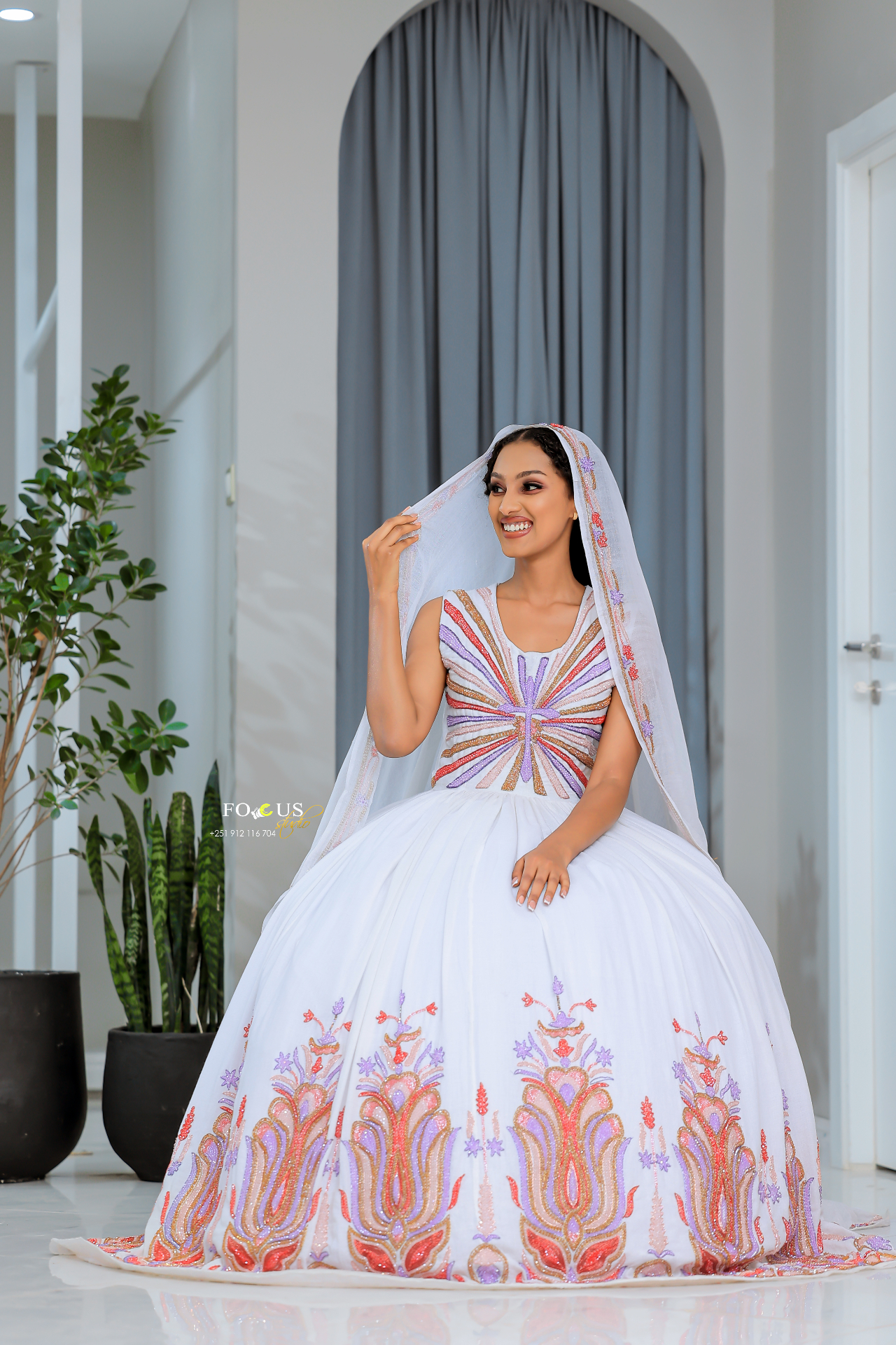 A model wearing a Next Fashion Design atelier look
