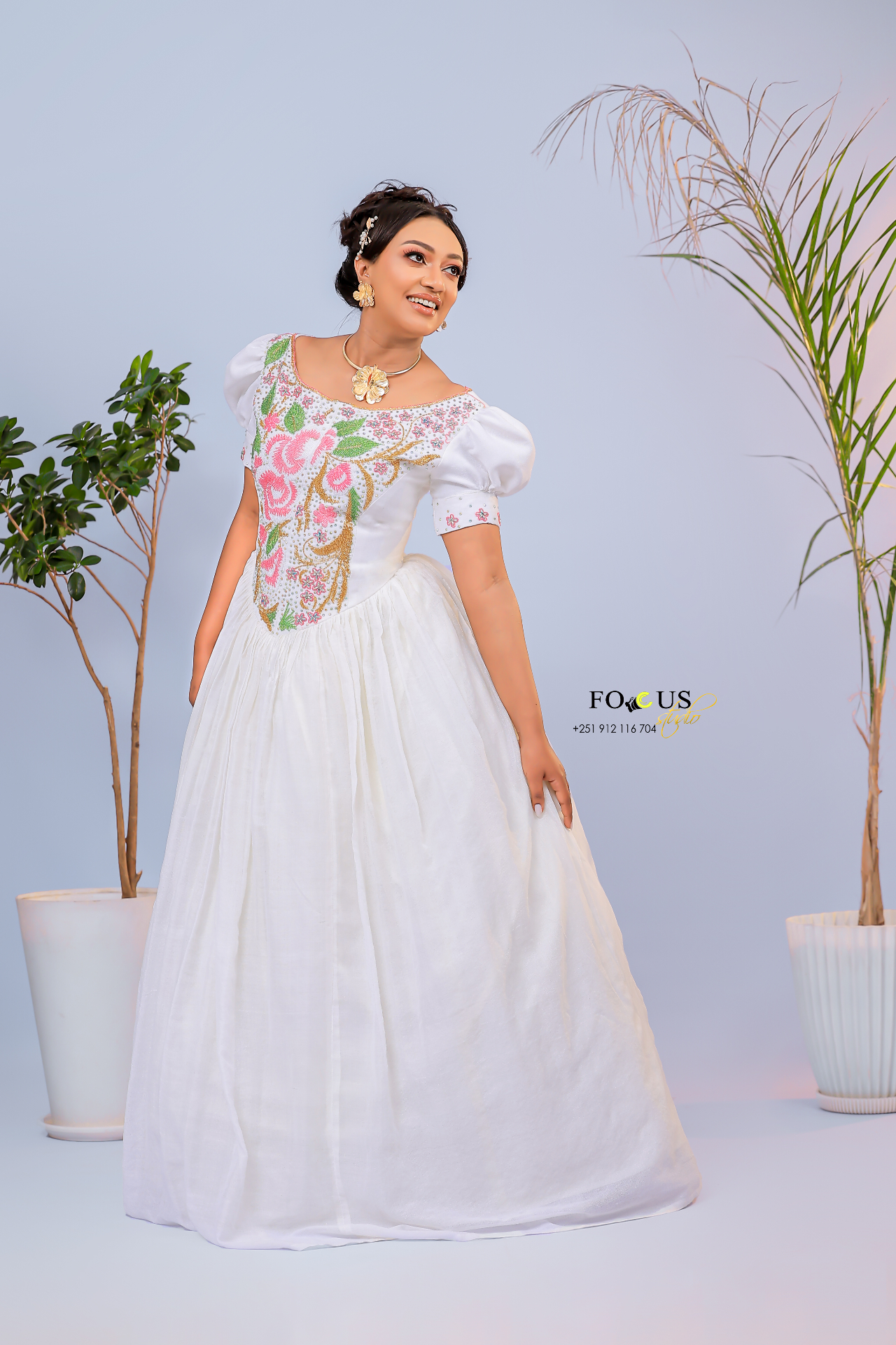 A couture silhouette with decorative finishings